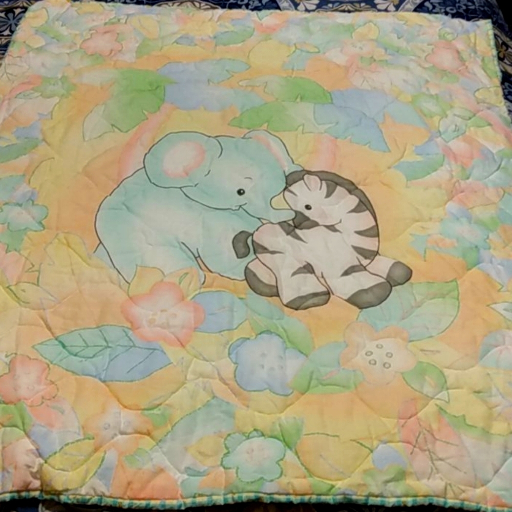 Multi colored handmade baby quilt